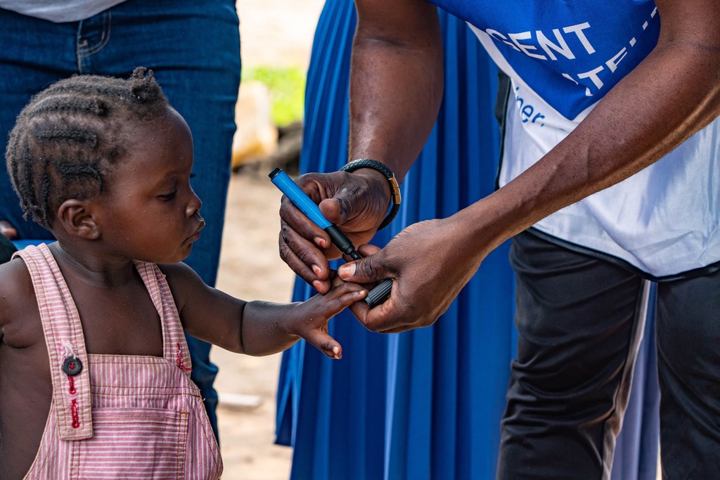 A child has her finger marked after receiving the polio vaccine in Kwango province, the Democratic Republic of the Congo.
